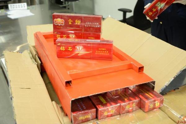 “便携式接叠桌”“商用开水器”暗藏走私香烟