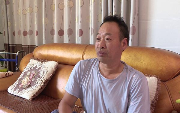 周立新：身患残疾不等不靠 通过自主创业致富